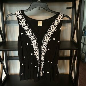 Sleeveless peplum top